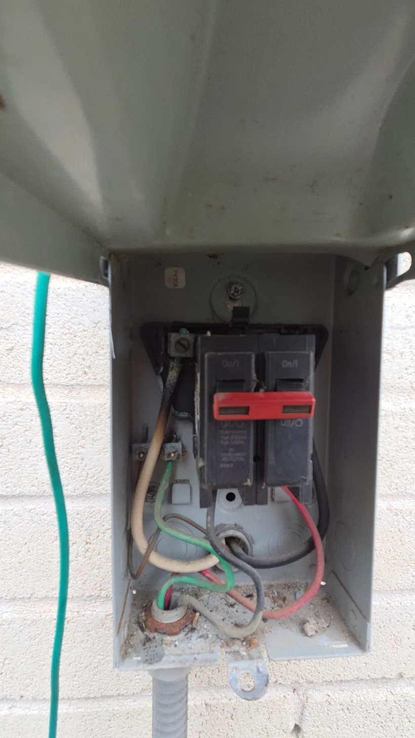 Burnt HVAC condensor disconnect Houston TX 77071