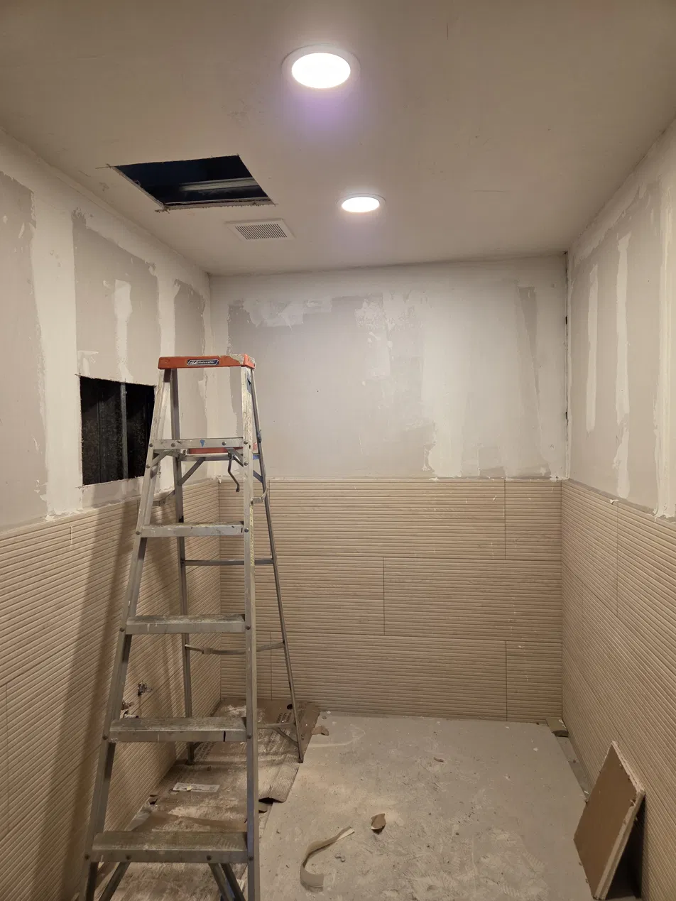 Energized recessed lights and bathroom extractor Houston TX 77071