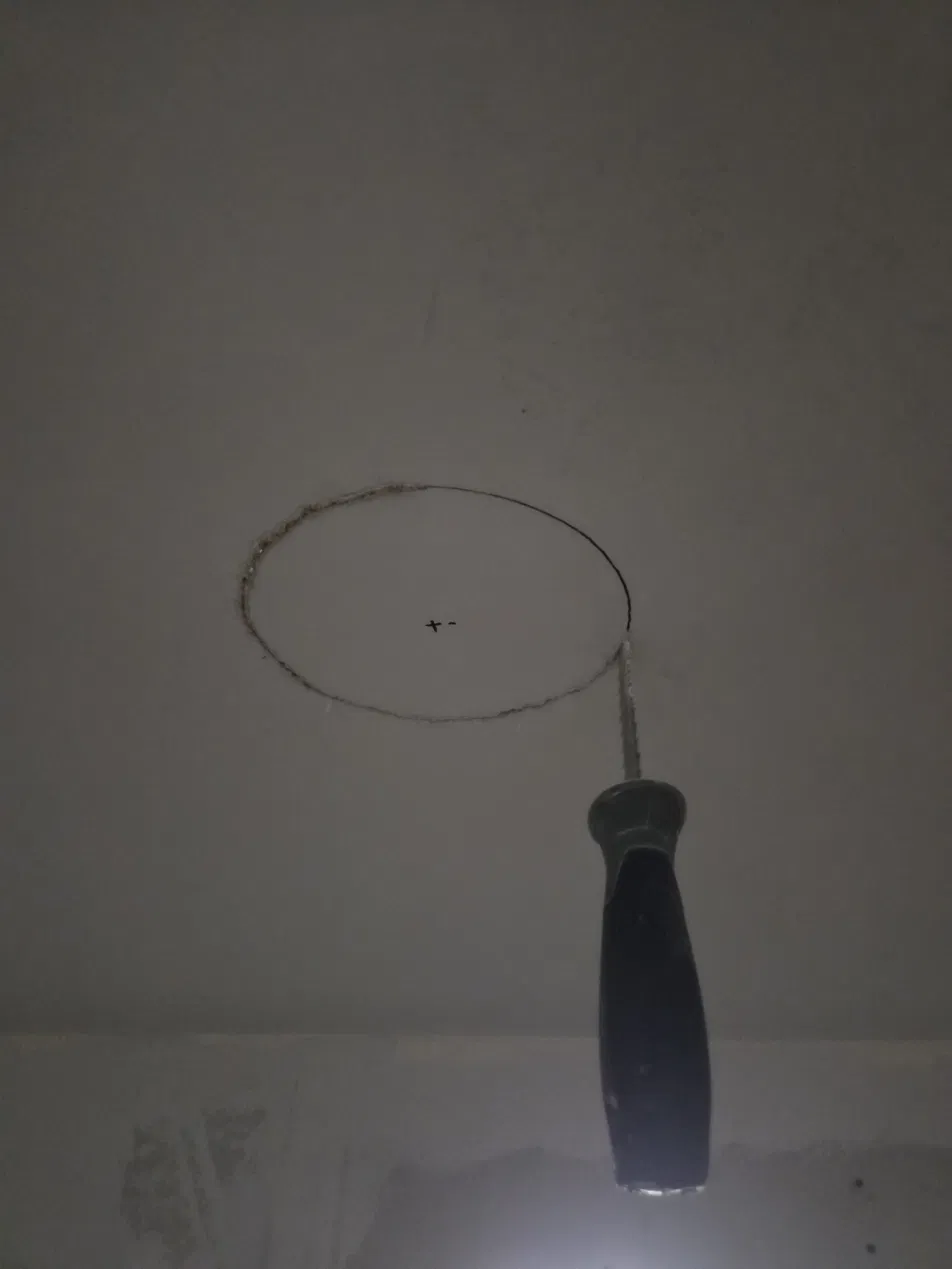 Cutting hole for recessed light Houston TX 77071